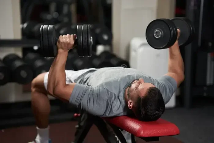 How to Pick Up Dumbbells for Bench Press